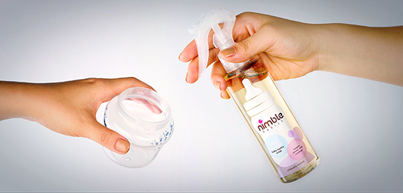 Product demonstration of Nimble Babies Milk Buster in use with a bottle